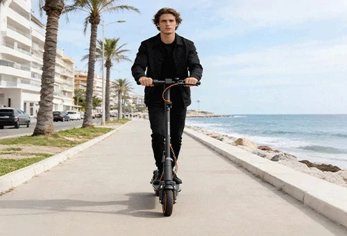 TODIMART electric scooter travelling along a scenic European road