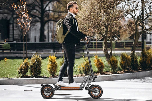 TODIMART electric scooter rider travelling through a city street