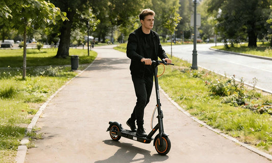 Rider enjoying TODIMART electric scooter in city park